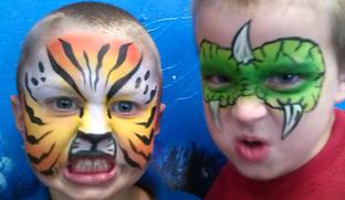 JoAnna Esposito Festival Face Painter in Tampa St Petersburg Florida CT USA tiger and dragon