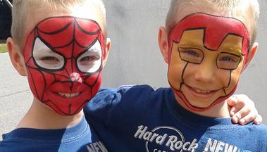 kids face painting spiderman